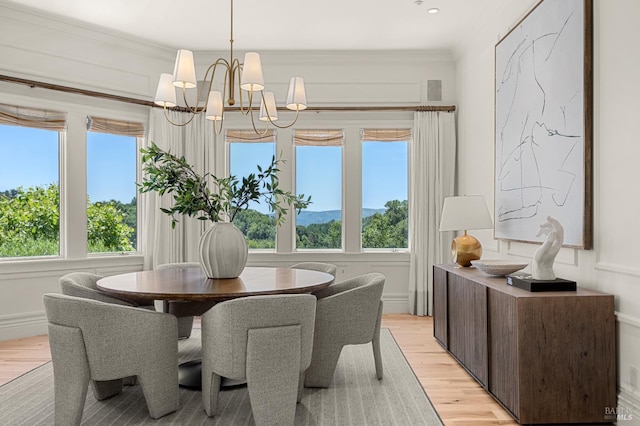 30 Sandy Ln, Mill Valley, CA 94941 - dining space featuring light wood finished floors, a chandelier, and crown molding