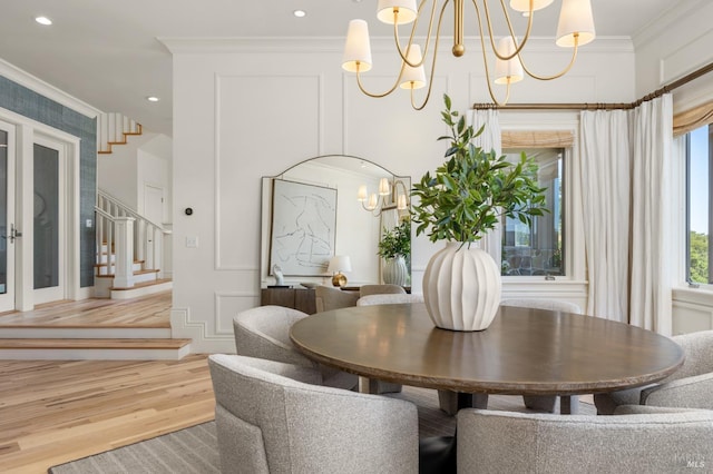 30 Sandy Ln, Mill Valley, CA 94941 - dining space with a chandelier, crown molding, wood finished floors, stairway, and recessed lighting