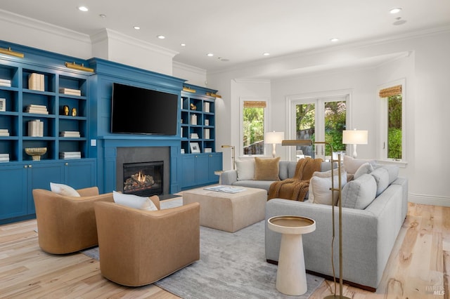 30 Sandy Ln, Mill Valley, CA 94941 - living room featuring light wood finished floors, a glass covered fireplace, ornamental molding, and recessed lighting