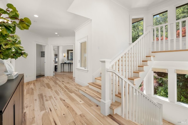 30 Sandy Ln, Mill Valley, CA 94941 - stairway featuring healthy amount of natural light, wood finished floors, ornamental molding, recessed lighting, and baseboards