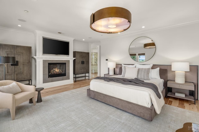 30 Sandy Ln, Mill Valley, CA 94941 - bedroom featuring wood finished floors, crown molding, recessed lighting, and a glass covered fireplace