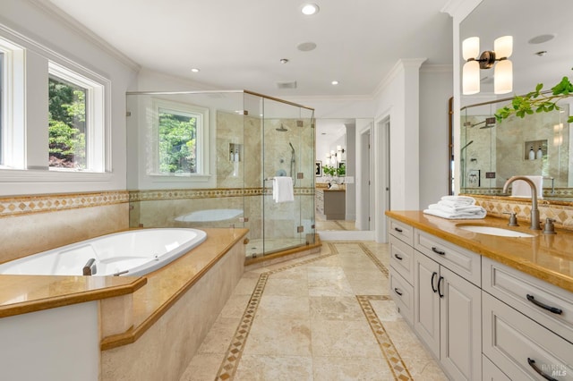 30 Sandy Ln, Mill Valley, CA 94941 - full bath with inlaid floor details, vanity, a shower stall, a garden tub, and ornamental molding