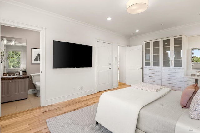 30 Sandy Ln, Mill Valley, CA 94941 - bedroom featuring light wood finished floors, ornamental molding, a sink, ensuite bathroom, and recessed lighting