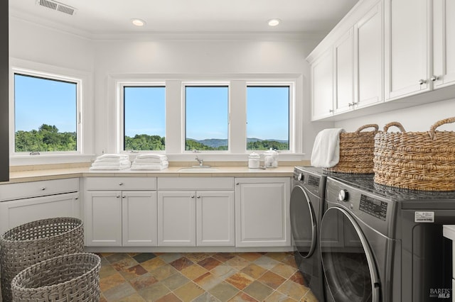 30 Sandy Ln, Mill Valley, CA 94941 - laundry room featuring cabinet space, washer and clothes dryer, light stone finish flooring, recessed lighting, and crown molding