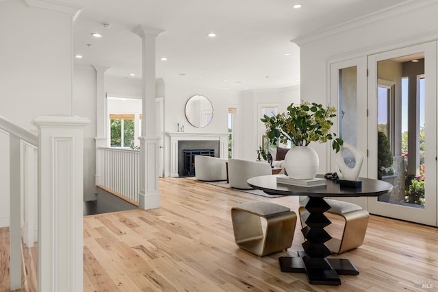 30 Sandy Ln, Mill Valley, CA 94941 - dining area with light wood-type flooring, ornamental molding, recessed lighting, a fireplace, and decorative columns