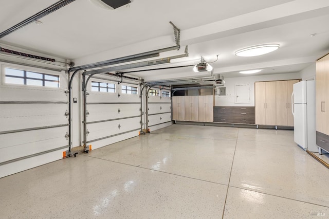 30 Sandy Ln, Mill Valley, CA 94941 - garage featuring freestanding refrigerator and a garage door opener