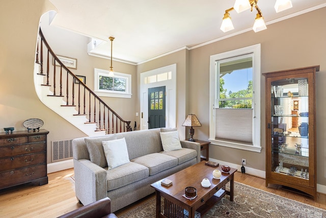 406 Franklin St, Napa, CA 94559 - living room with stairway, wood finished floors, crown molding, and healthy amount of natural light
