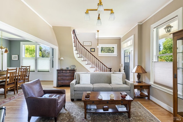 406 Franklin St, Napa, CA 94559 - living room featuring healthy amount of natural light, wood finished floors, ornamental molding, stairs, and baseboards