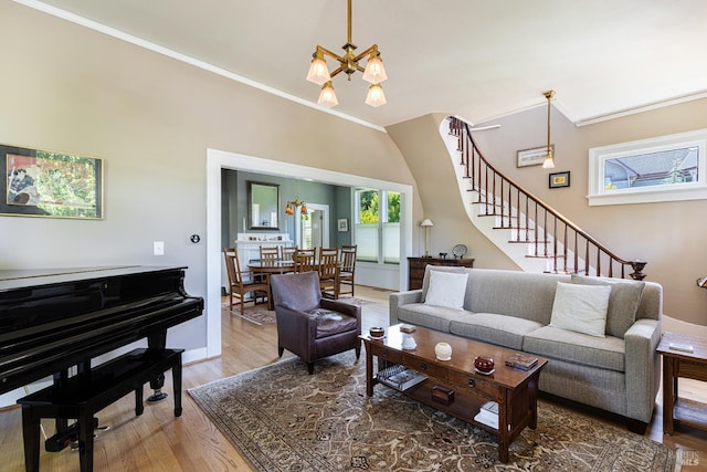 406 Franklin St, Napa, CA 94559 - living area with a chandelier, crown molding, wood finished floors, stairway, and baseboards