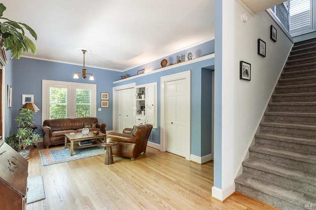 406 Franklin St, Napa, CA 94559 - living room with stairs, light wood-type flooring, baseboards, and ornamental molding