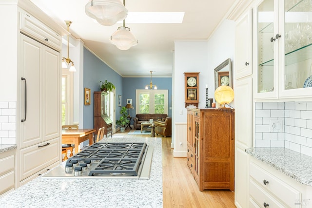 406 Franklin St, Napa, CA 94559 - interior space featuring light wood finished floors, ornamental molding, a wainscoted wall, and a skylight