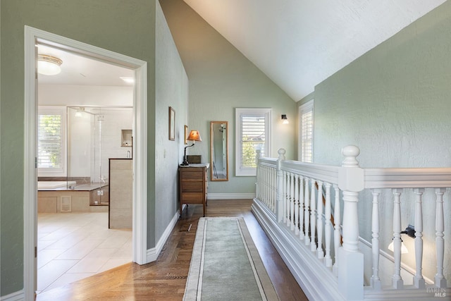 406 Franklin St, Napa, CA 94559 - corridor with wood finished floors, baseboards, and high vaulted ceiling