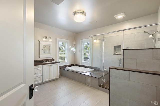406 Franklin St, Napa, CA 94559 - bathroom featuring a garden tub, vanity, a stall shower, and tile patterned flooring