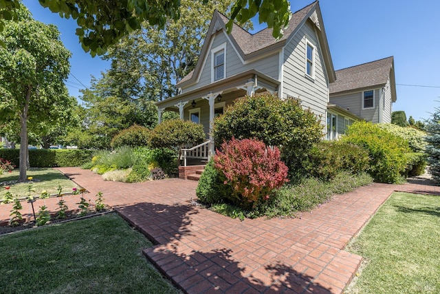 406 Franklin St, Napa, CA 94559 - view of home's exterior with covered porch, a yard, and roof with shingles