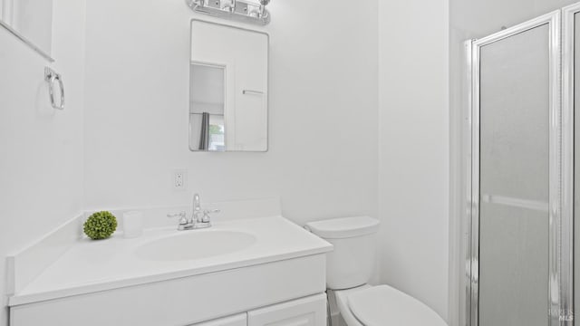 265 Chestnut St, Dixon, CA 95620 - bathroom featuring vanity, toilet, and a stall shower