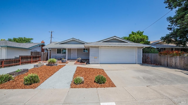 265 Chestnut St, Dixon, CA 95620 - ranch-style house featuring a garage, driveway, and covered porch