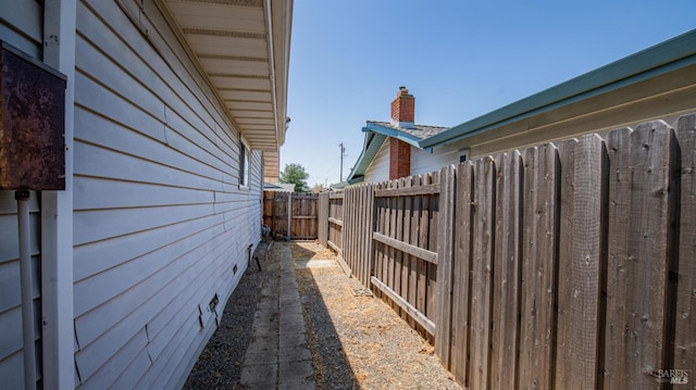 265 Chestnut St, Dixon, CA 95620 - view of side of home with a chimney