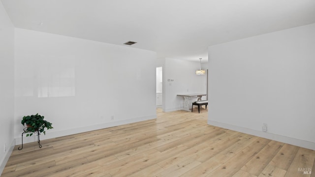 265 Chestnut St, Dixon, CA 95620 - empty room featuring light wood-style flooring and baseboards