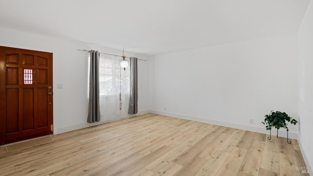 265 Chestnut St, Dixon, CA 95620 - spare room featuring light wood-style floors, plenty of natural light, and baseboards