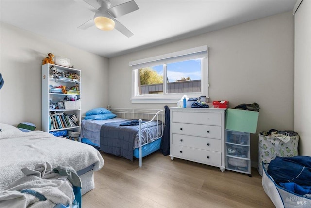 319 N St Unit 2, Healdsburg, CA 95448 - bedroom with light wood finished floors and a ceiling fan