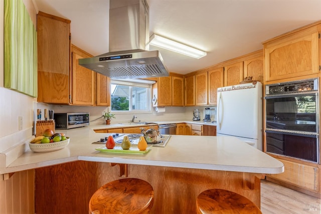 1961 Foothill Dr, Redwood Valley, CA 95470 - kitchen featuring extractor fan, freestanding refrigerator, stovetop, and light countertops