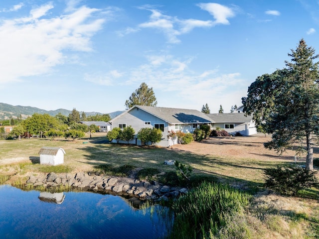 1961 Foothill Dr, Redwood Valley, CA 95470 - back of property with a mountain view and a yard