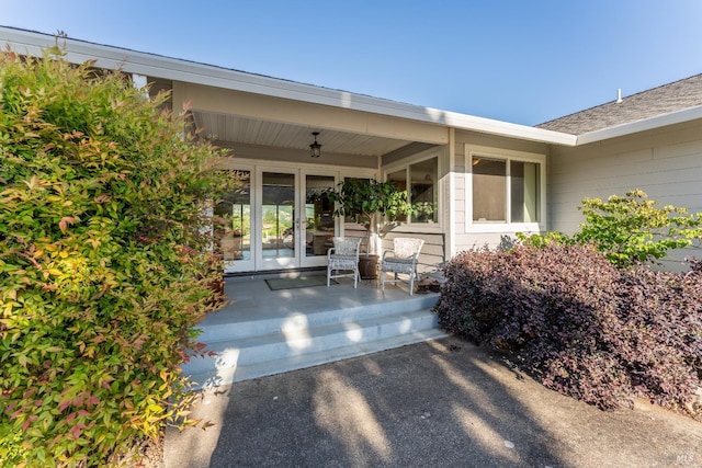 1961 Foothill Dr, Redwood Valley, CA 95470 - view of exterior entry with french doors, covered porch, and roof with shingles