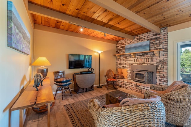 1961 Foothill Dr, Redwood Valley, CA 95470 - living area with hardwood / wood-style flooring, wooden ceiling with exposed beams, and baseboards