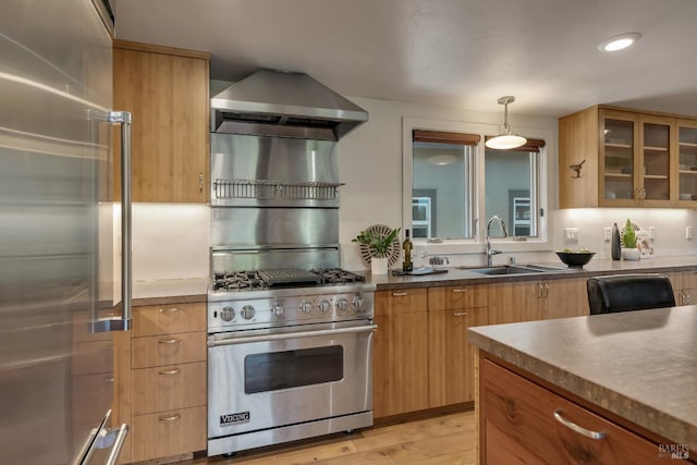 260 Geysers Rd, Cloverdale, CA 95425 - kitchen featuring high quality appliances, extractor fan, a sink, glass insert cabinets, and light wood-style flooring