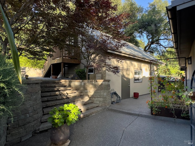 260 Geysers Rd, Cloverdale, CA 95425 - view of home's exterior with a patio area, stucco siding, and stairs