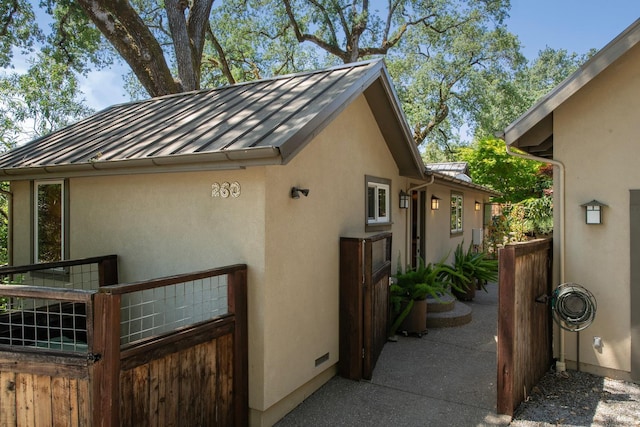 260 Geysers Rd, Cloverdale, CA 95425 - view of side of home featuring a standing seam roof, stucco siding, and metal roof