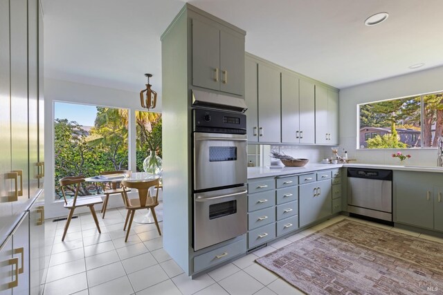 1 Rosebank Ln, Kentfield, CA 94904 - kitchen featuring stainless steel appliances, light countertops, and gray cabinetry