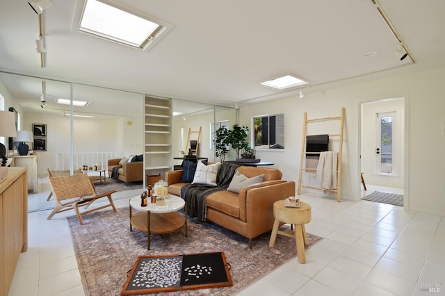 1 Rosebank Ln, Kentfield, CA 94904 - living area featuring track lighting, light tile patterned flooring, healthy amount of natural light, and built in shelves
