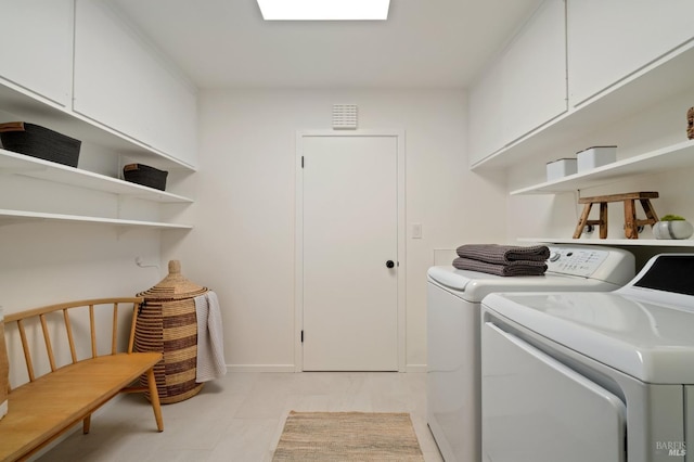 1 Rosebank Ln, Kentfield, CA 94904 - washroom featuring separate washer and dryer, cabinet space, and baseboards
