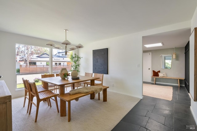 1 Rosebank Ln, Kentfield, CA 94904 - dining space featuring plenty of natural light, baseboards, and stone tile flooring