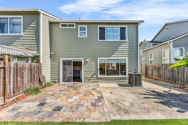 247 Clearpointe Dr, Vallejo, CA 94591 - rear view of house with central AC, a patio, and a fenced backyard