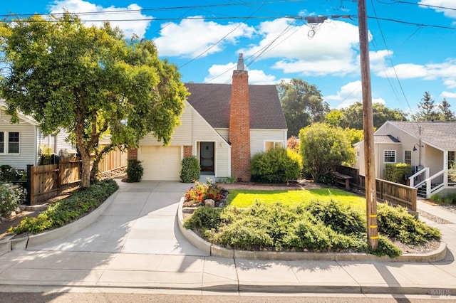 1186 E Ave, Napa, CA 94559 - view of front of house featuring brick siding, concrete driveway, a chimney, and a garage