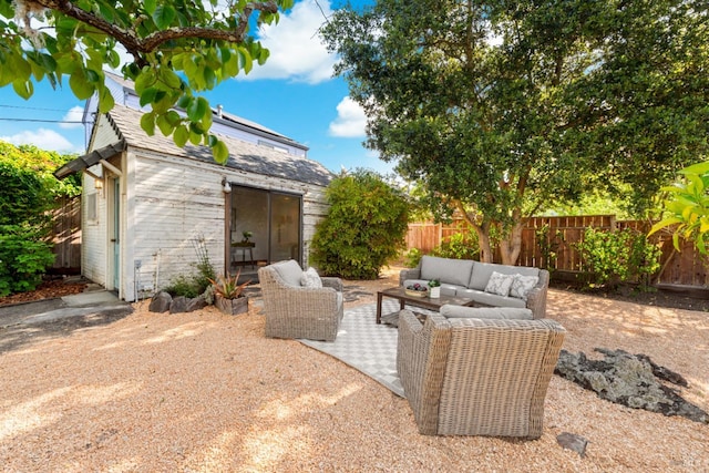 1186 E Ave, Napa, CA 94559 - fenced backyard featuring outdoor lounge area, an outbuilding, and a patio area