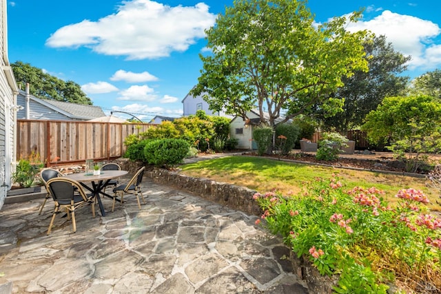 1186 E Ave, Napa, CA 94559 - fenced backyard with outdoor dining space and a patio