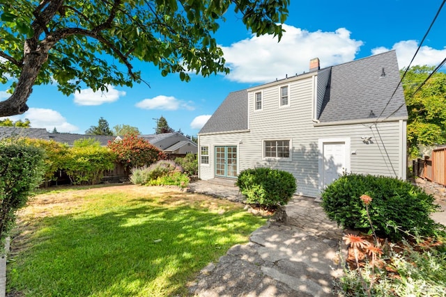 1186 E Ave, Napa, CA 94559 - back of property with a chimney, a shingled roof, and a patio