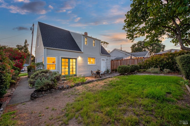 1186 E Ave, Napa, CA 94559 - rear view of house featuring a chimney, roof with shingles, and a patio