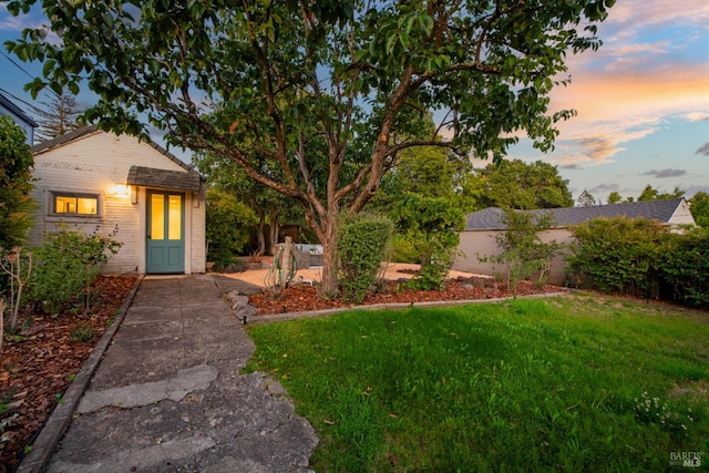1186 E Ave, Napa, CA 94559 - yard at dusk featuring a lawn