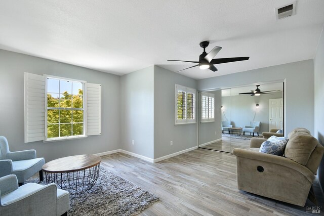 712 Tahoe Ct, Fairfield, CA 94534 - living room featuring a ceiling fan, wood finished floors, and baseboards