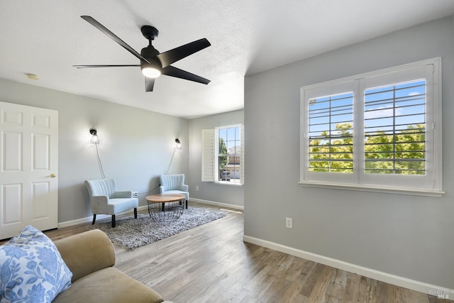 712 Tahoe Ct, Fairfield, CA 94534 - living area featuring baseboards, wood finished floors, and ceiling fan