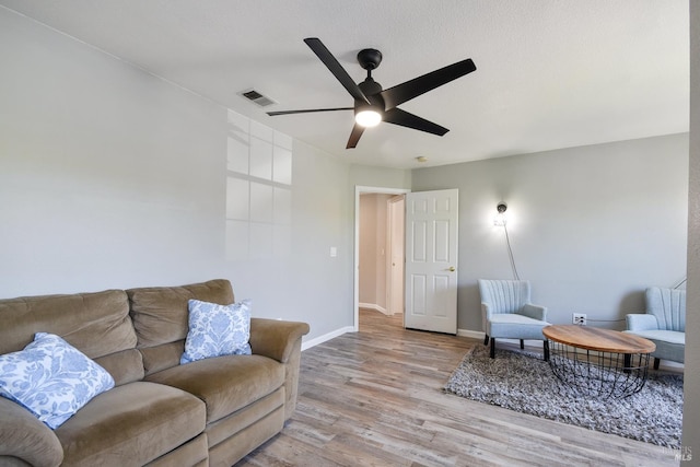 712 Tahoe Ct, Fairfield, CA 94534 - living area featuring wood finished floors, a ceiling fan, and baseboards