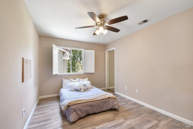 712 Tahoe Ct, Fairfield, CA 94534 - bedroom featuring baseboards, wood finished floors, and ceiling fan