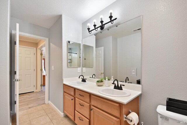 712 Tahoe Ct, Fairfield, CA 94534 - bathroom with toilet, double vanity, and tile patterned flooring