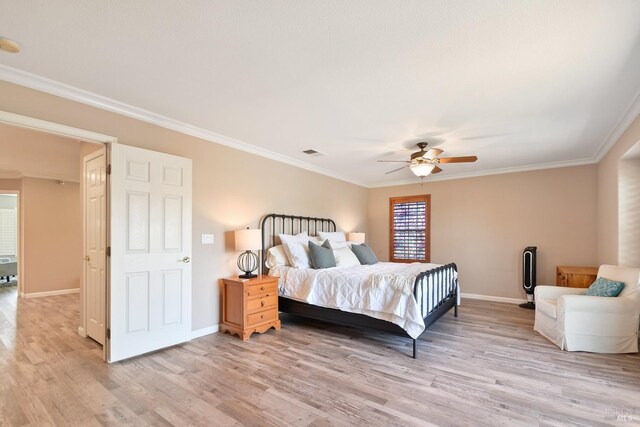712 Tahoe Ct, Fairfield, CA 94534 - bedroom with baseboards, light wood finished floors, ornamental molding, and a ceiling fan
