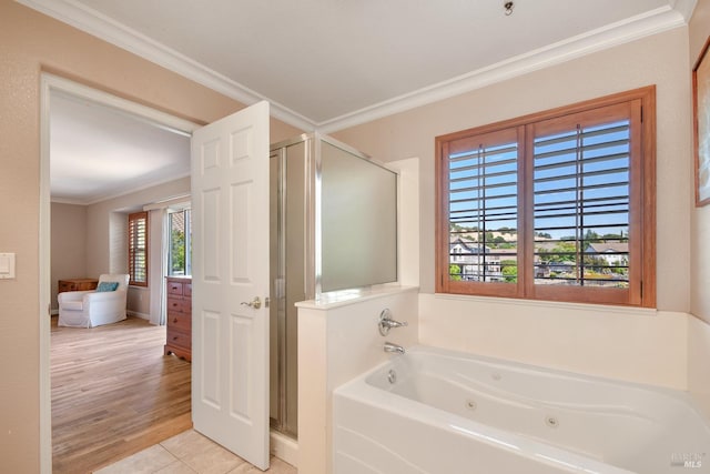 712 Tahoe Ct, Fairfield, CA 94534 - full bathroom featuring a shower stall, crown molding, a jetted tub, and tile patterned flooring