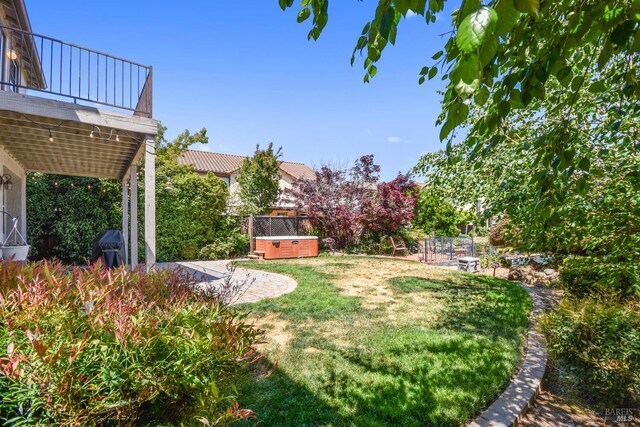712 Tahoe Ct, Fairfield, CA 94534 - view of green lawn featuring a hot tub and a patio